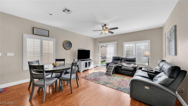8139 Skytop Ledge Ave, Las Vegas, NV 89178 - living area featuring a ceiling fan and light wood-style flooring
