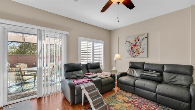 8139 Skytop Ledge Ave, Las Vegas, NV 89178 - living area featuring ceiling fan, healthy amount of natural light, and wood finished floors