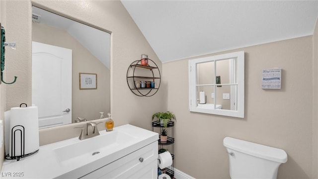 8139 Skytop Ledge Ave, Las Vegas, NV 89178 - bathroom featuring vanity and lofted ceiling