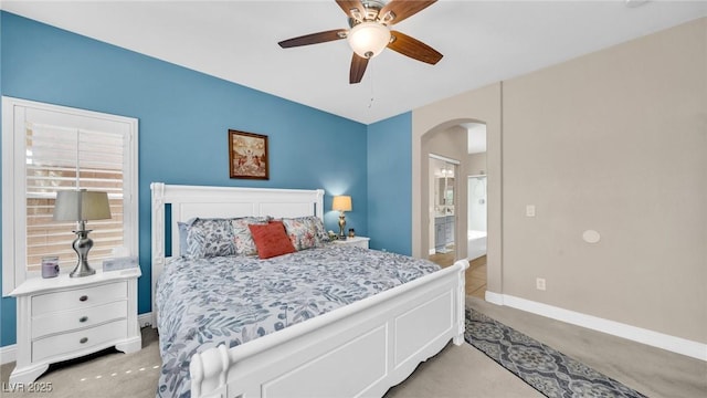 8139 Skytop Ledge Ave, Las Vegas, NV 89178 - bedroom with arched walkways and a ceiling fan