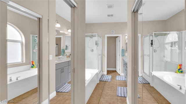 8139 Skytop Ledge Ave, Las Vegas, NV 89178 - full bathroom with a garden tub, vanity, and a stall shower