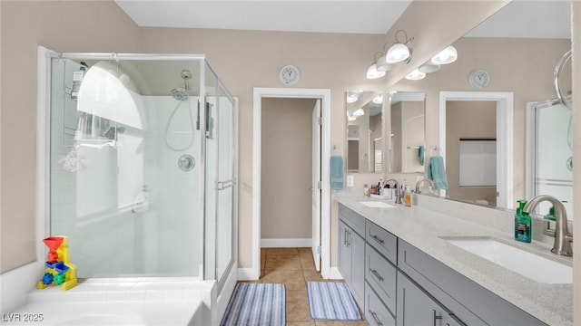 8139 Skytop Ledge Ave, Las Vegas, NV 89178 - full bathroom with a shower stall, double vanity, and tile patterned flooring