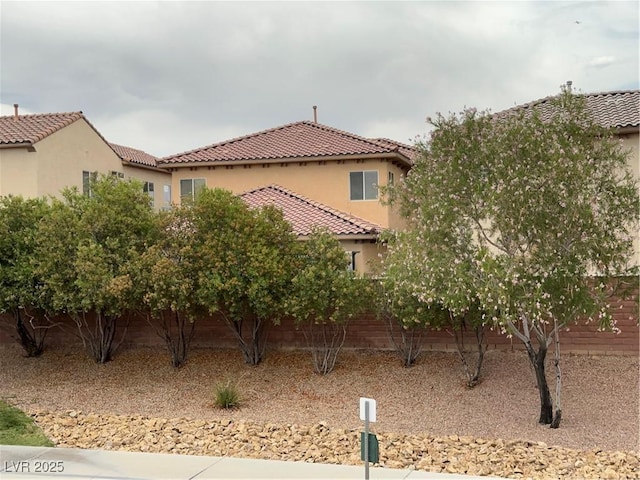 8139 Skytop Ledge Ave, Las Vegas, NV 89178 - view of front of property featuring a tile roof and stucco siding