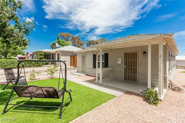 531 New Mexico St, Boulder City, NV 89005 - back of house featuring a yard and stucco siding