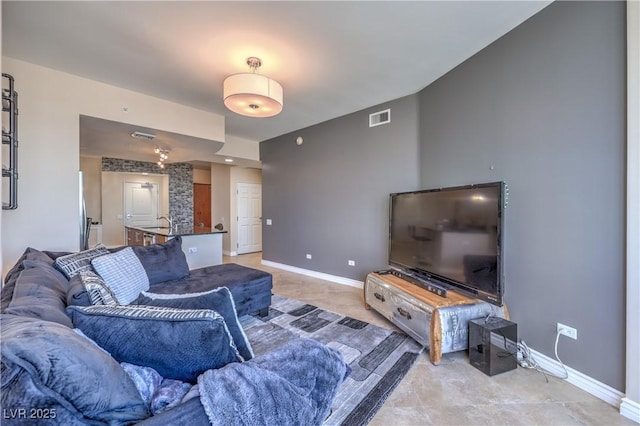 200 W Sahara Ave Unit 2210, Las Vegas, NV 89102 - living room with baseboards and light tile patterned floors