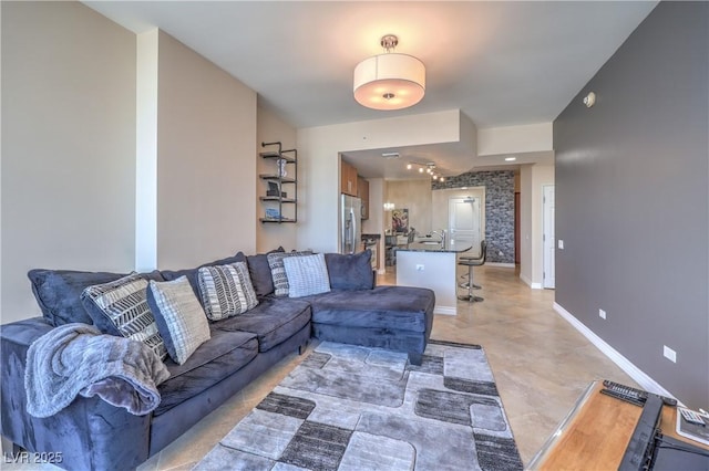 200 W Sahara Ave Unit 2210, Las Vegas, NV 89102 - living room with baseboards