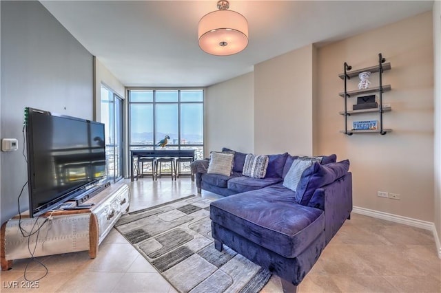 200 W Sahara Ave Unit 2210, Las Vegas, NV 89102 - living area with a wall of windows and light tile patterned floors