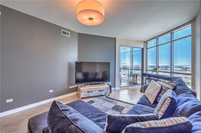 200 W Sahara Ave Unit 2210, Las Vegas, NV 89102 - living area with floor to ceiling windows and baseboards