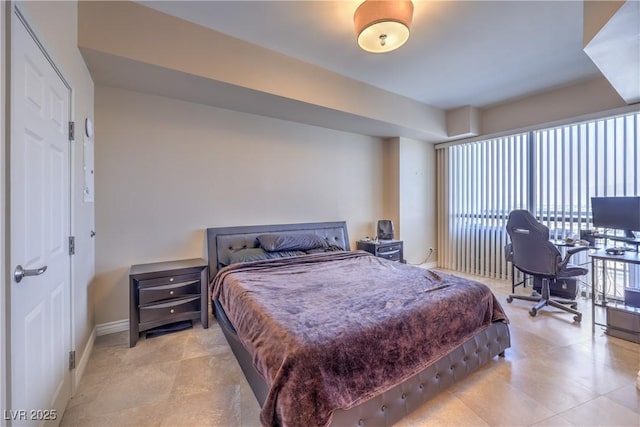 200 W Sahara Ave Unit 2210, Las Vegas, NV 89102 - bedroom featuring light tile patterned floors and a desk