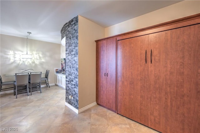 200 W Sahara Ave Unit 2210, Las Vegas, NV 89102 - interior space with a chandelier and light tile patterned flooring