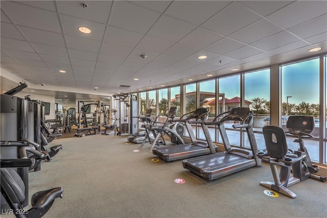 200 W Sahara Ave Unit 2210, Las Vegas, NV 89102 - exercise room featuring expansive windows, a drop ceiling, and carpet floors