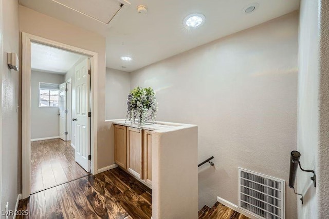 10719 Tottenham Ave, Las Vegas, NV 89135 - hall with an upstairs landing and dark wood-type flooring