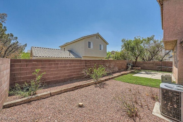 10719 Tottenham Ave, Las Vegas, NV 89135 - fenced backyard with a patio