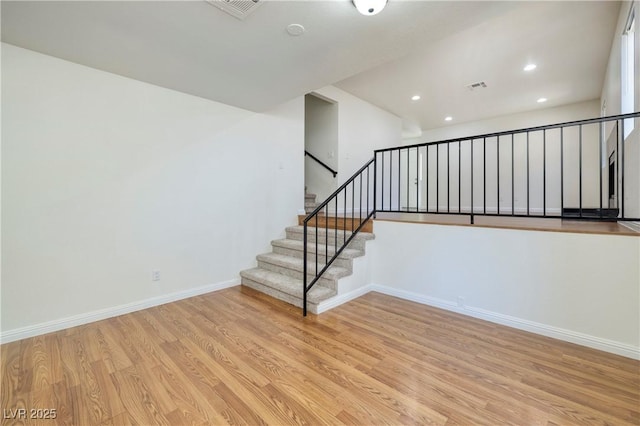 3972 Tirana Way, Las Vegas, NV 89103 - staircase featuring wood finished floors and recessed lighting