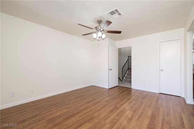 3972 Tirana Way, Las Vegas, NV 89103 - empty room featuring ceiling fan and wood finished floors