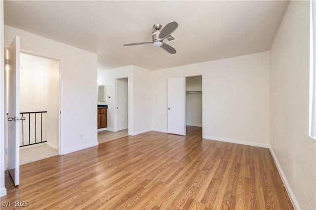 3972 Tirana Way, Las Vegas, NV 89103 - unfurnished bedroom with light wood finished floors, ceiling fan, and ensuite bath