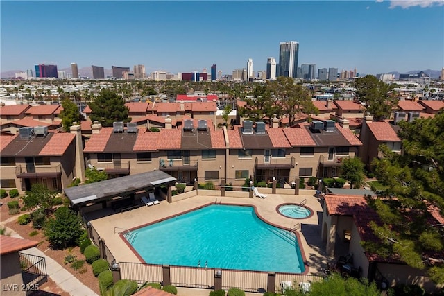 3972 Tirana Way, Las Vegas, NV 89103 - community pool with a hot tub and a skyline view
