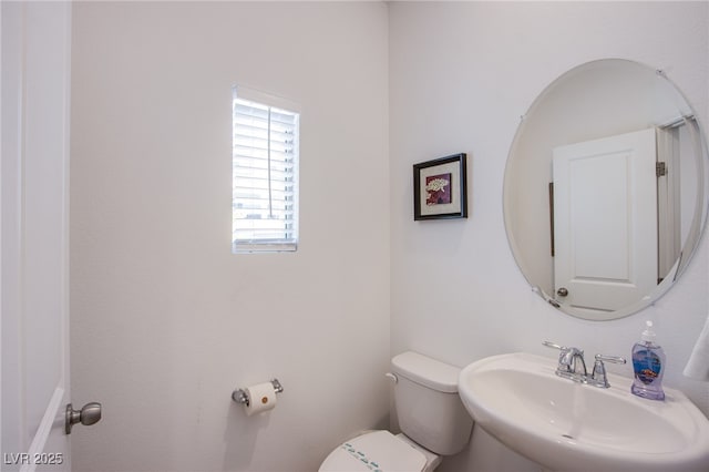 10435 Rose Palisade St, Las Vegas, NV 89141 - half bathroom featuring a sink and toilet
