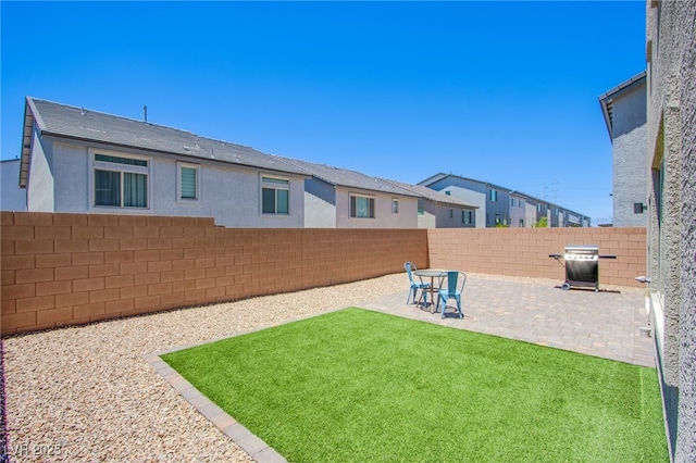 10435 Rose Palisade St, Las Vegas, NV 89141 - fenced backyard with a patio area