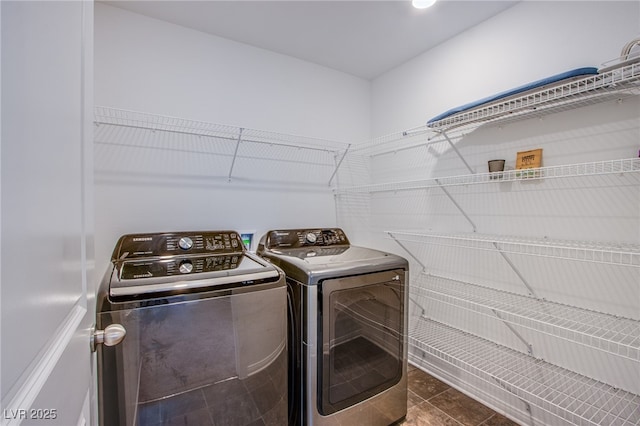 10435 Rose Palisade St, Las Vegas, NV 89141 - washroom featuring washing machine and clothes dryer and tile patterned floors