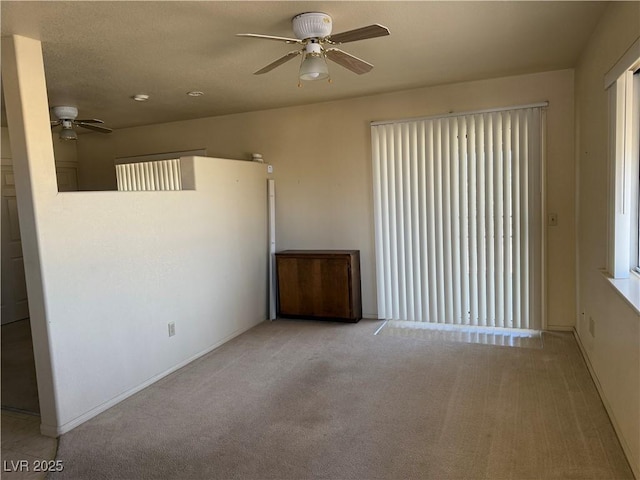 3090 N Woodchips Rd, Pahrump, NV 89060 - carpeted empty room featuring a ceiling fan and baseboards