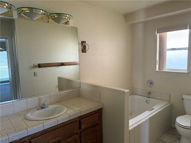 3090 N Woodchips Rd, Pahrump, NV 89060 - bathroom featuring a bath, vanity, and tile patterned flooring