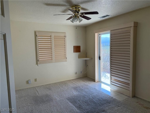 3090 N Woodchips Rd, Pahrump, NV 89060 - carpeted spare room featuring ceiling fan and a textured ceiling