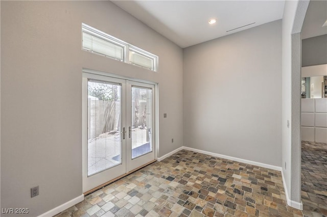 2017 Slow Wind St, Las Vegas, NV 89134 - doorway featuring stone finish flooring, french doors, and recessed lighting