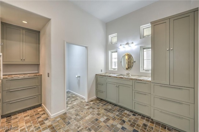 2017 Slow Wind St, Las Vegas, NV 89134 - full bathroom with vanity and stone finish flooring