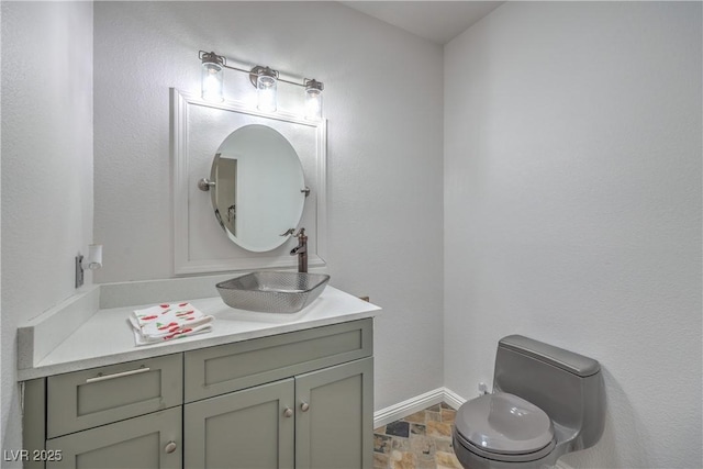 2017 Slow Wind St, Las Vegas, NV 89134 - half bath featuring vanity and stone finish flooring