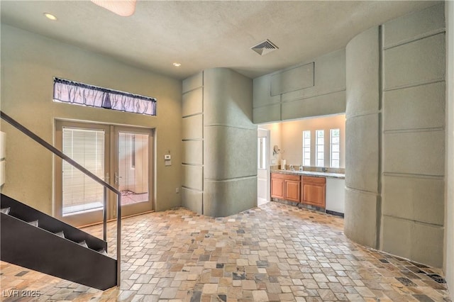 2017 Slow Wind St, Las Vegas, NV 89134 - kitchen featuring french doors, white dishwasher, and recessed lighting