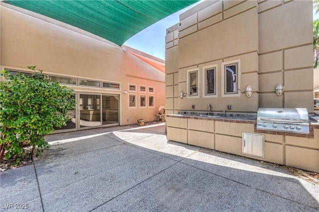 2017 Slow Wind St, Las Vegas, NV 89134 - view of patio featuring exterior kitchen and a sink