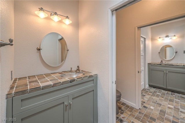 2017 Slow Wind St, Las Vegas, NV 89134 - bathroom with vanity and toilet