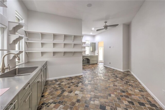 2017 Slow Wind St, Las Vegas, NV 89134 - kitchen featuring open shelves, ceiling fan, dark stone finish flooring, recessed lighting, and gray cabinetry
