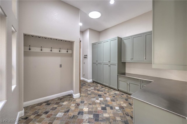 2017 Slow Wind St, Las Vegas, NV 89134 - mudroom with baseboards and stone finish flooring