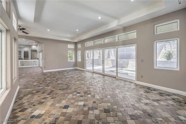 2017 Slow Wind St, Las Vegas, NV 89134 - spare room with a raised ceiling, ceiling fan, and recessed lighting