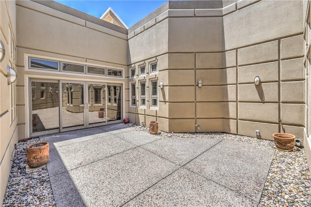 2017 Slow Wind St, Las Vegas, NV 89134 - view of patio / terrace featuring french doors