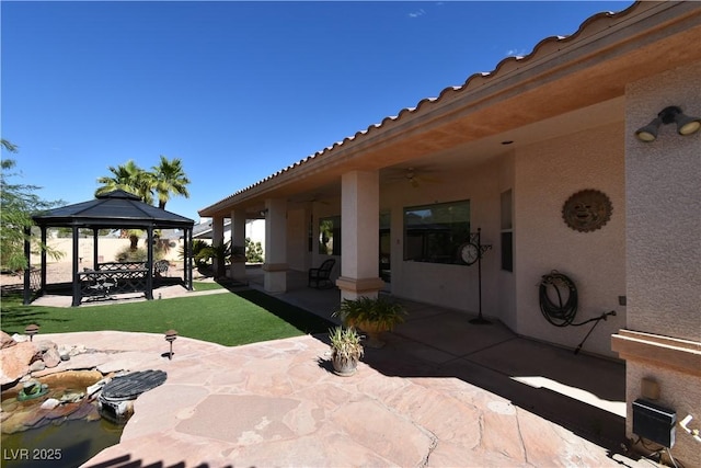 7250 Birkland Ct, Las Vegas, NV 89117 - view of patio featuring ceiling fan and a gazebo