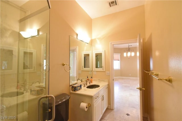 7250 Birkland Ct, Las Vegas, NV 89117 - full bath featuring vanity, a stall shower, and a chandelier