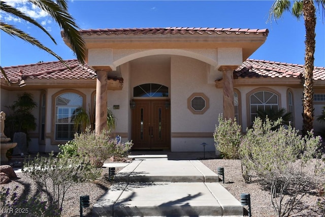 7250 Birkland Ct, Las Vegas, NV 89117 - doorway to property with stucco siding and a tiled roof