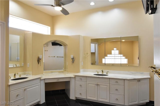 7250 Birkland Ct, Las Vegas, NV 89117 - bathroom with a ceiling fan, vanity, tile patterned flooring, and a high ceiling