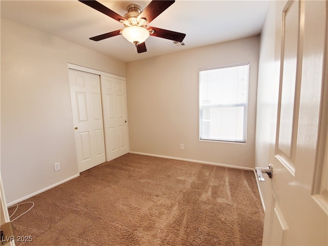 9069 Tantalizing Ave, Las Vegas, NV 89149 - unfurnished bedroom featuring carpet, a closet, and a ceiling fan