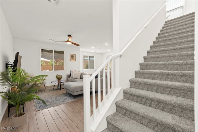 9743 Mojave Mountain St, Las Vegas, NV 89166 - stairs with wood finished floors, ceiling fan, and recessed lighting