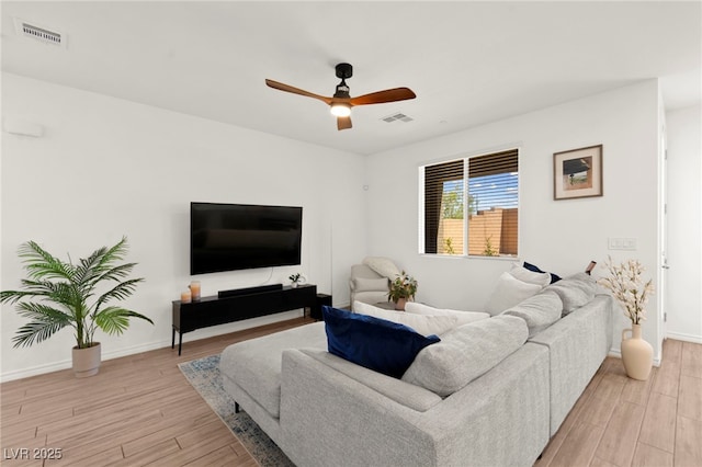 9743 Mojave Mountain St, Las Vegas, NV 89166 - living area featuring light wood-type flooring and ceiling fan