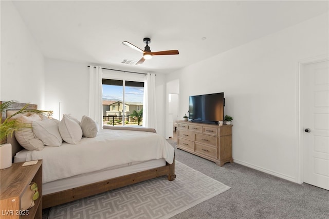 9743 Mojave Mountain St, Las Vegas, NV 89166 - bedroom featuring access to outside, light colored carpet, and a ceiling fan