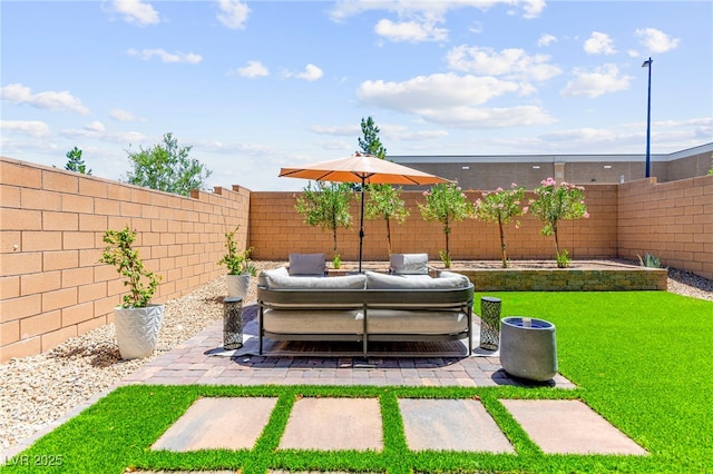 9743 Mojave Mountain St, Las Vegas, NV 89166 - fenced backyard featuring an outdoor living space and a patio