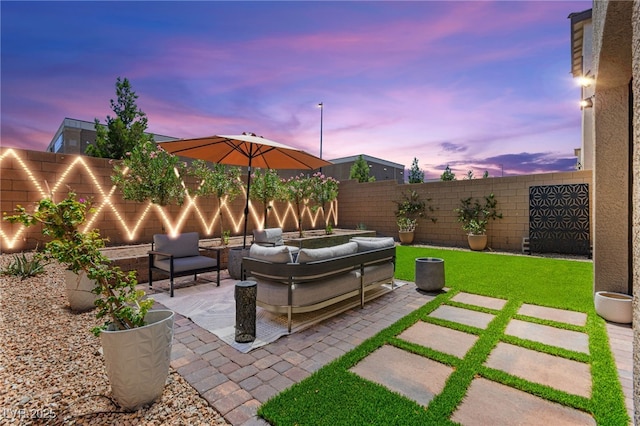 9743 Mojave Mountain St, Las Vegas, NV 89166 - fenced backyard with outdoor lounge area and a patio area