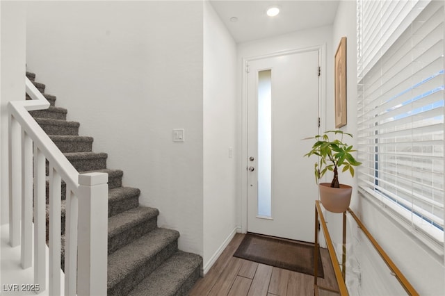 9743 Mojave Mountain St, Las Vegas, NV 89166 - foyer with wood finished floors, stairs, and recessed lighting