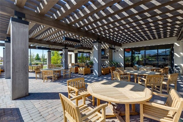 9743 Mojave Mountain St, Las Vegas, NV 89166 - view of patio / terrace with outdoor dining area, a pergola, and an outdoor living space