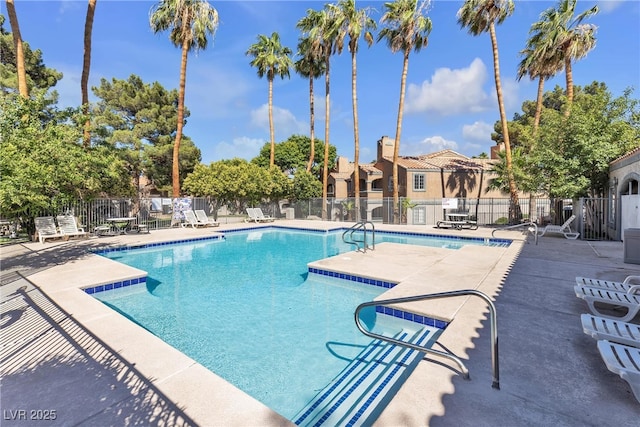220 Mission Catalina Ln Unit 208, Las Vegas, NV 89107 - community pool with a patio area